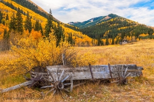Ashcroft-Village-abandoned-cart-with-wooden-wagon-wheels