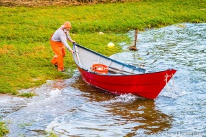 Fisherman-pushing-out-Dory-Cape-Cod-Massachusetts-