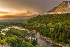 Fog_lifting_over_Swiftcurrent_River_Many_Glacier_area_Glacier_National_Park_Montana_USA