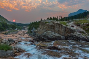 Red_Sun_Sunrise_-_Swiftcurrent_Falls_Many_Glacier_area_Glacier_National_Park_Montana_USA-c78