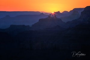 Sun_Dipping_Below_Grand_Canyon_Edge_from_Desert_View_720