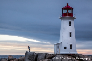 3 Peggys Cove Lighthouse and Boy Nova Scotia Canada