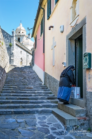 Nun-Entering-Convent-near-San-Lorenzo-Church-in-Porto-Venere