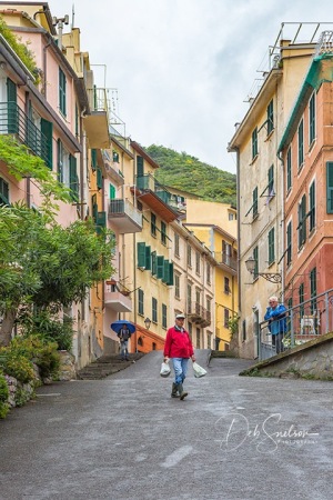 Three-Men-of-the-Centuries-old-Fishing-Village-of-Riomaggiaore-Italy