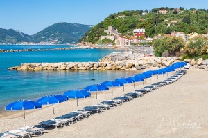 Lerici-Beach-View-to-San-Terenzo-Italy-with-Beach-Umbrellas