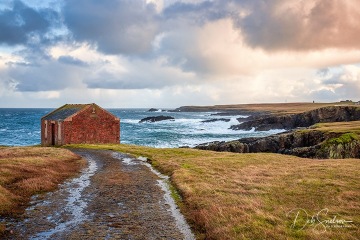 Cottage-on-Coast-of-Isle-of-Lewis-Scotland