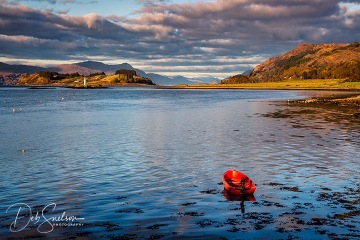 Red-Boat-and-Lighthouse-Port-Appin-Argyle-Bute-Scotland