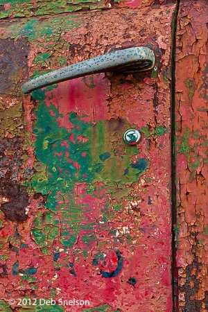 truck-graveyard-door-peeling-paint-and-rust